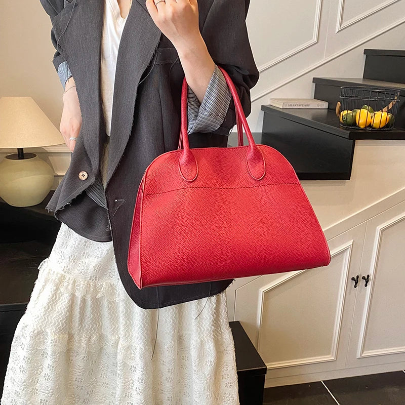 SALOME DESIGNER-HANDTASCHE MIT GRIFF & LYCHÉE-STRUKTUR