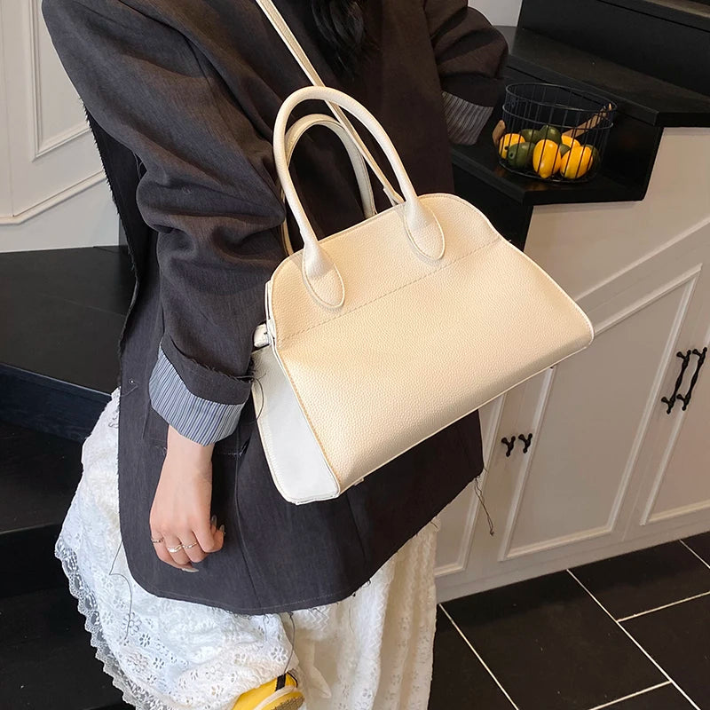 SALOME DESIGNER-HANDTASCHE MIT GRIFF & LYCHÉE-STRUKTUR