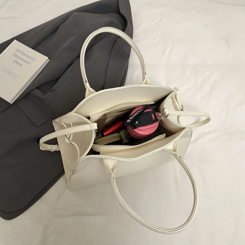 SALOME DESIGNER-HANDTASCHE MIT GRIFF & LYCHÉE-STRUKTUR