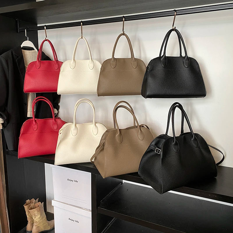 SALOME DESIGNER-HANDTASCHE MIT GRIFF & LYCHÉE-STRUKTUR