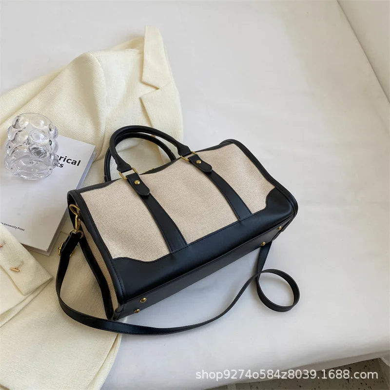 SIENA WEEKENDER-REISETASCHE AUS CANVAS UND LEDERDETAILS
