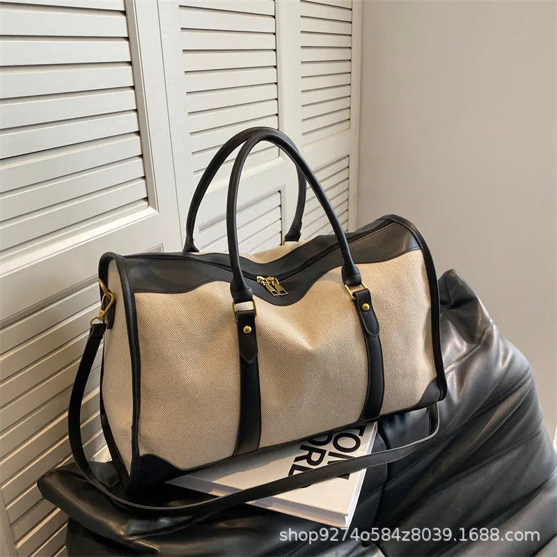 SIENA WEEKENDER-REISETASCHE AUS CANVAS UND LEDERDETAILS