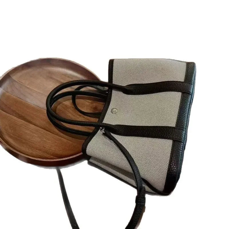 TULUM SEGELTUCH-SHOPPERTASCHE MIT RINDSLEDER UND STRUKTURDESIGN