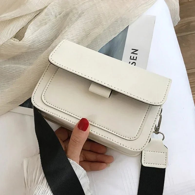 NOELY UMHÄNGETASCHE – KOMPAKTE FLAP-BAG MIT SCHULTERGURT