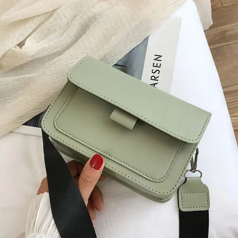 NOELY UMHÄNGETASCHE – KOMPAKTE FLAP-BAG MIT SCHULTERGURT