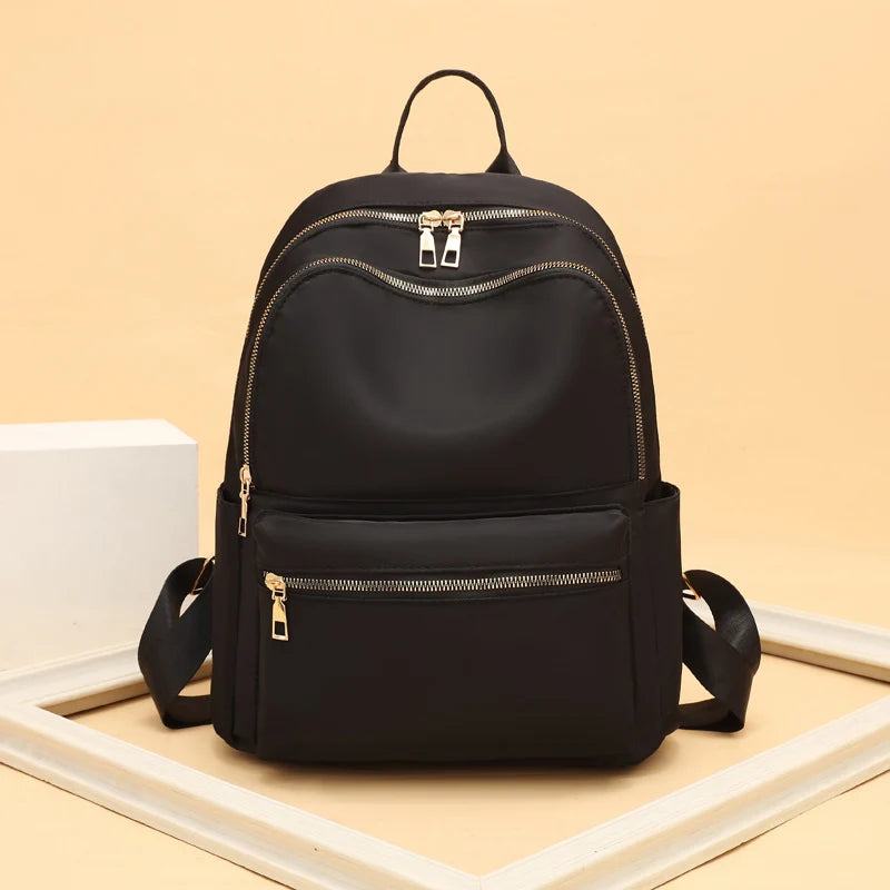 VANORA SCHULRUCKSACK – WASSERABWEISENDER OXFORD-RUCKSACK MIT GOLDDETAILS