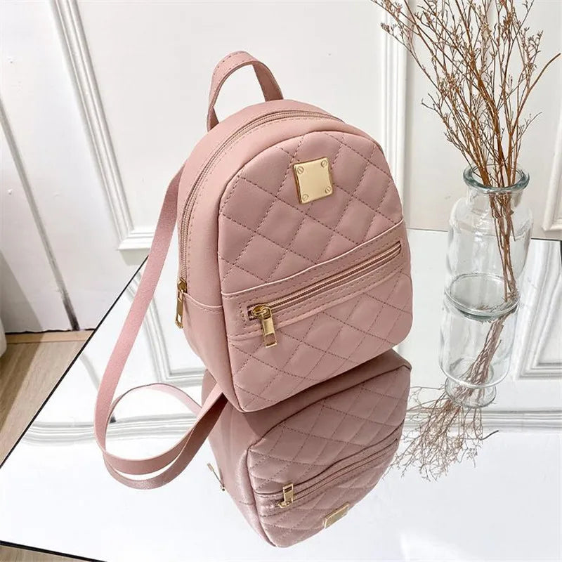 NOUVELLE SCHULTERTASCHE – STEPP-RUCKSACK FÜR DAMEN MIT GOLDDETAILS