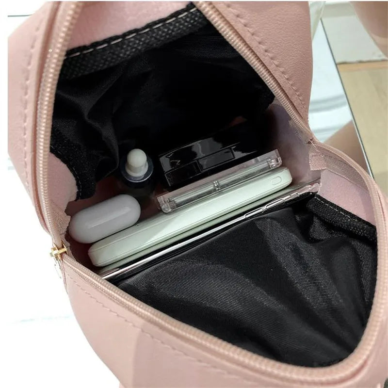 NOUVELLE SCHULTERTASCHE – STEPP-RUCKSACK FÜR DAMEN MIT GOLDDETAILS