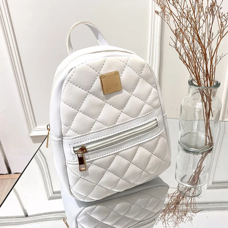 NOUVELLE SCHULTERTASCHE – STEPP-RUCKSACK FÜR DAMEN MIT GOLDDETAILS