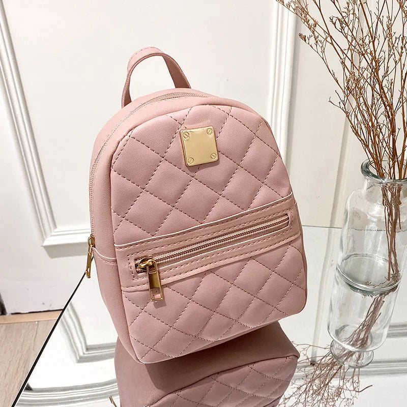 NOUVELLE SCHULTERTASCHE – STEPP-RUCKSACK FÜR DAMEN MIT GOLDDETAILS