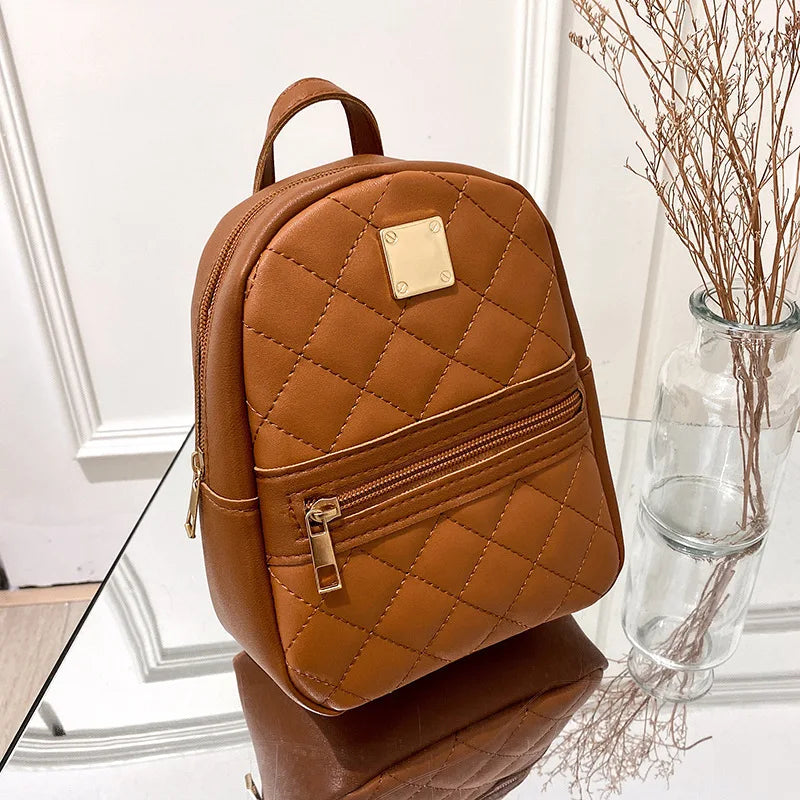 NOUVELLE SCHULTERTASCHE – STEPP-RUCKSACK FÜR DAMEN MIT GOLDDETAILS