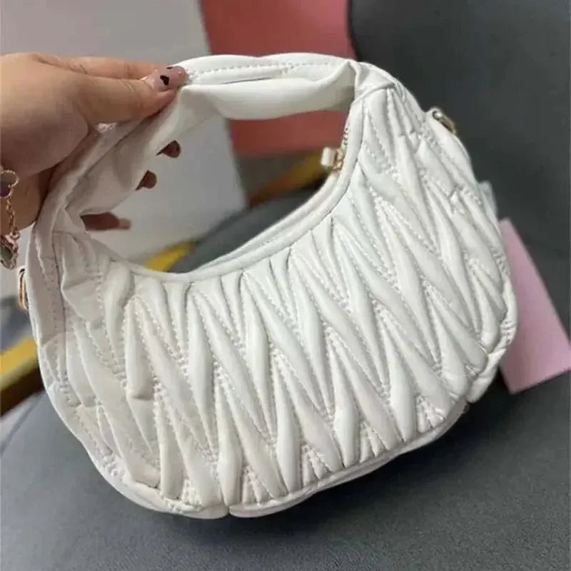 ARIELA PU LEDER SCHULTERTASCHE MIT TREND-STEPPUNG
