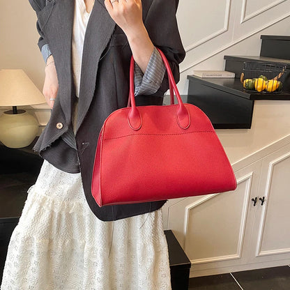 SALOME DESIGNER-HANDTASCHE MIT GRIFF & LYCHÉE-STRUKTUR