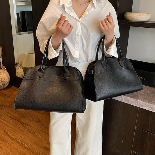 SALOME DESIGNER-HANDTASCHE MIT GRIFF & LYCHÉE-STRUKTUR