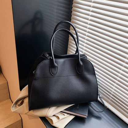 SALOME DESIGNER-HANDTASCHE MIT GRIFF & LYCHÉE-STRUKTUR