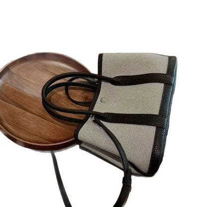 TULUM SEGELTUCH-SHOPPERTASCHE MIT RINDSLEDER UND STRUKTURDESIGN