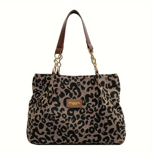 LEONORA LEO-SHOULDERBAG – STATEMENT-SCHULTERTASCHE MIT GOLDCHAIN