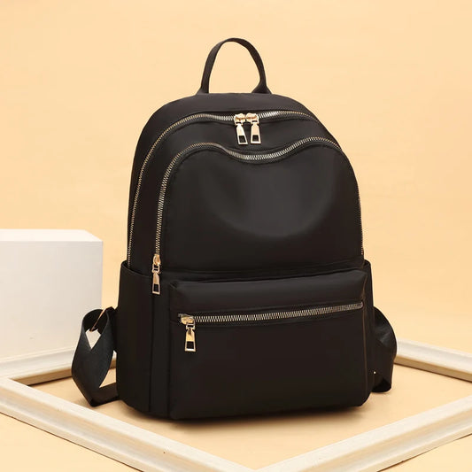 VANORA SCHULRUCKSACK – WASSERABWEISENDER OXFORD-RUCKSACK MIT GOLDDETAILS
